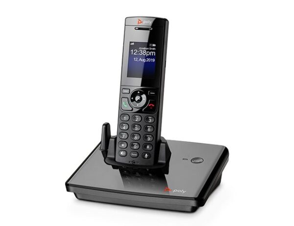 Black and silver phone on table representing an Office telephone system and PBX phone service for efficient business communication